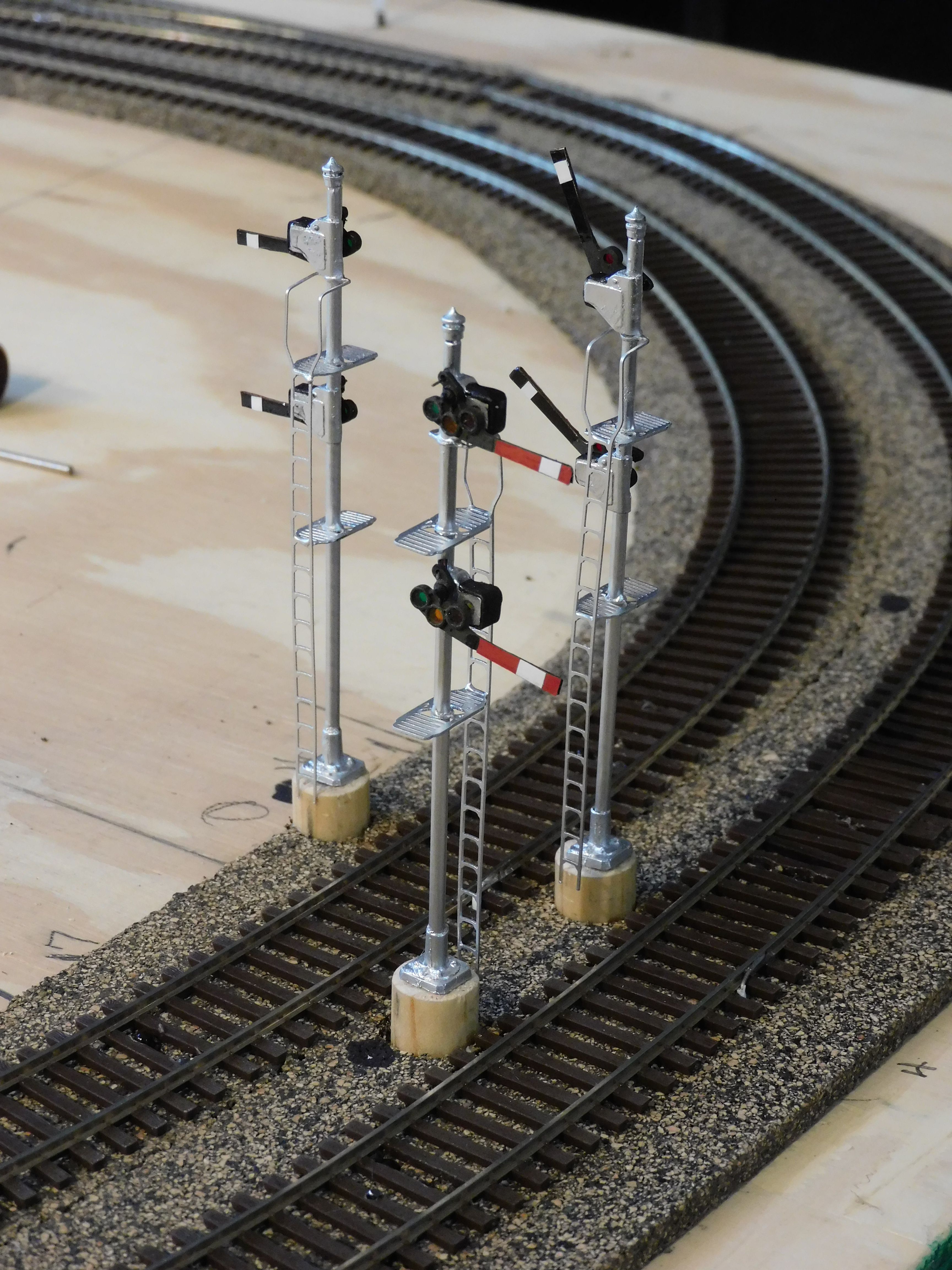 Cluster of three semaphore towers mounted on track